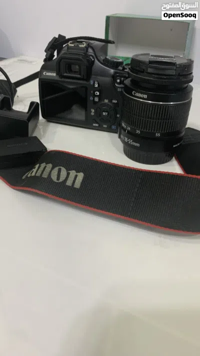Canon EOS DSLR 1100 with 18-55mm Kit Lens, strap and charger Shutter Counter): 11,355) 4