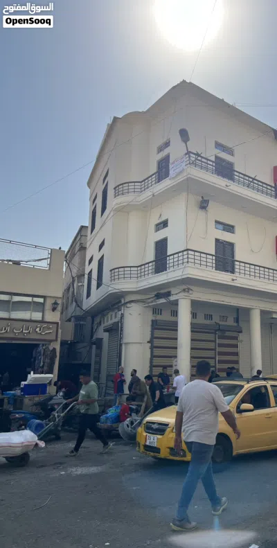 نصف بناية تجارية للأيجار تحتوي على محل + 2 طابق 2