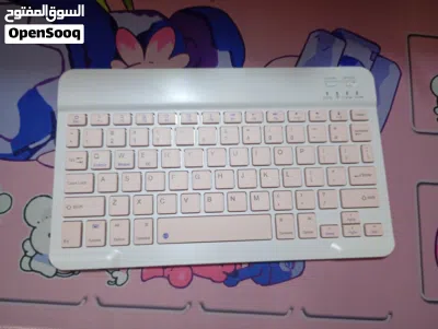 كيبورد بلوتوث مع حافظة 10 انج مع باد ماوس لون وردي الكيبورد يشتغل على كل الاجهزة عن طريق البلوتوث 2