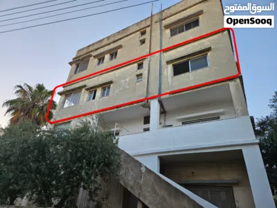 شقة طابق ثاني، مساحة 160، في منطقة بدر حي نزال بقرب صيدلية السنبلة، عمر البناء 32 سنة 3