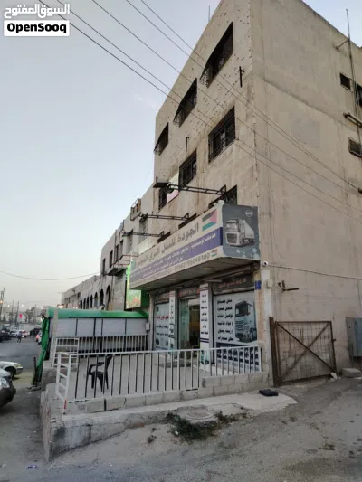 مجمع تجاري على الشارع الرئيسي قرب دوار الجمرك للبيع فارغا من المالك 4