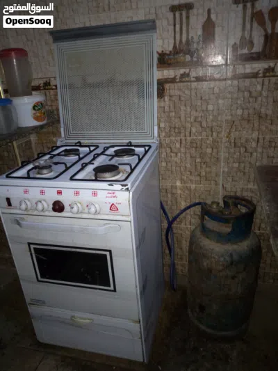 بوتاجاز ماركه نصر جاز لونه ابيض بحاله ممتازه بالغطاء الزجاجي 4 عيون متوسط الحجم 3