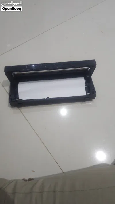 هذا الجهاز هو طابعة حراريه محموله 3