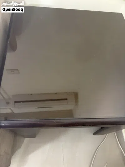 طاولة وسط ثقيله عليها سيكوريت زجاج 35 2