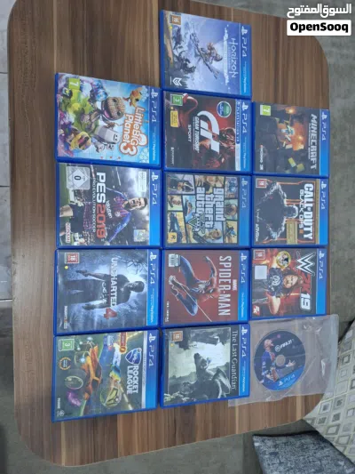 جهاز PlayStation 4 مستعمل بدون يد ومعه 12 لعبة 4