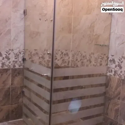 تركيب زجاج سكريت وشاورات بكس ومرايات وطاولات الطعام 4
