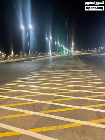 تخطيط طرق ومواقف السيارات ومحطات الوقود دهان حار وبارد ودهان بلدورات ورسومات المعاقين وترقيم المواقف 4