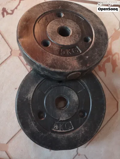 بار  حديد  + اوزان 15 كيلو  ................ . . . . . . . 4