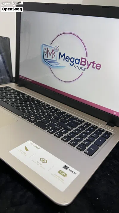 لابتوب ASUS VivoBook أنيق ونحيف - وبحالة ممتازة باللون الذهبي المميز 2
