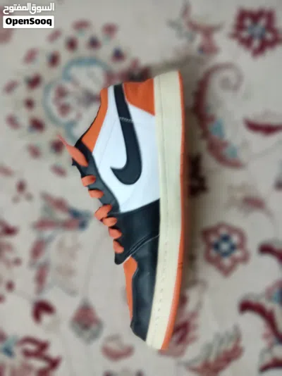 Nike air Jordan (black and orange mixed colors) size 43 2
