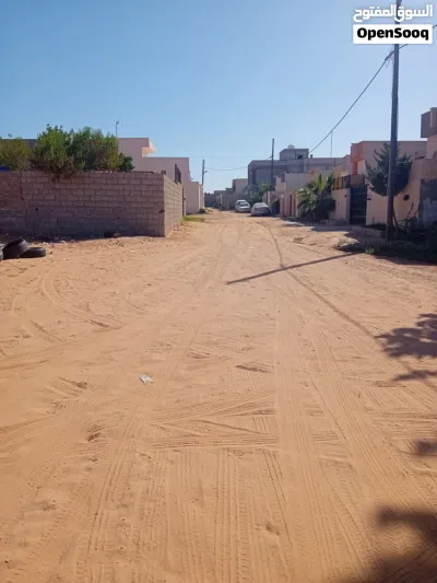 ارض البيع مكان عين زارة استراحه احمرء شارع اليبيا السعر كزززوين 2