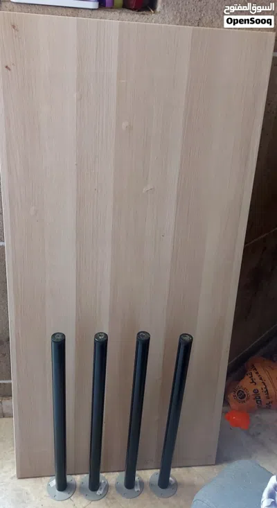 Table with four chairs for sale in Abu Dhabi, Al Nahyan Camp. Contact via WhatsApp at the number pro 2