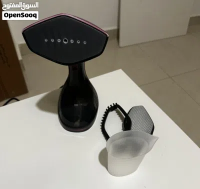 مكواية black and decker عالبخار مستعملة نضيفة جداً بتنحمل باليد وخفيفة 2