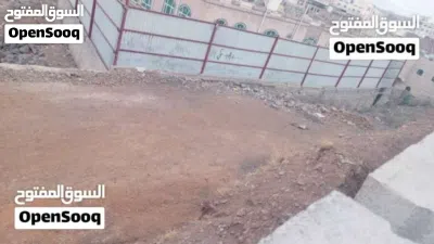 *للبيع أرض استثمارية - السنينة* ركنية جوار جامعة الناصر 5 لبن واجهتين: 13م على شارع 2