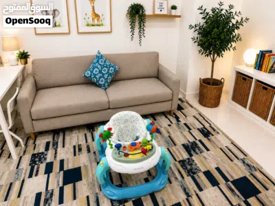 Junior Baby Walker Almost New عربة اطفال ماركة جونيور تقريباً جديدة 2