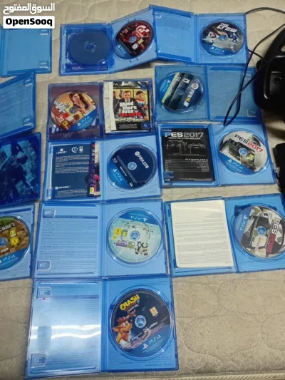 Ps4 slim مستعمل مع 13 سيدي العاب و اربع أيادي تحكم اصليه 2