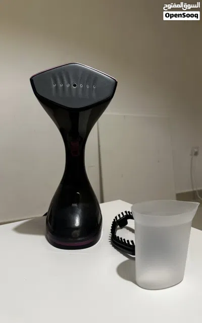 مكواية black and decker عالبخار مستعملة نضيفة جداً بتنحمل باليد وخفيفة 4