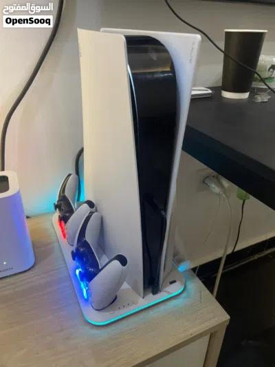 بلايستيشن فايف fat disk edition تأتي مع أيادي 2 و Rgb and cooling ps5 stand وCD GTAV 3