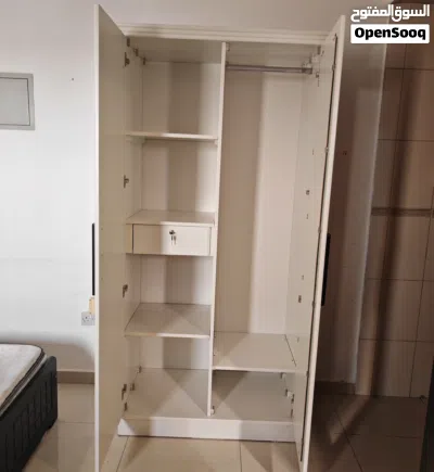 Wardrobe 2 doors with mirror .local made very strong heavy duty like new one month used only 2