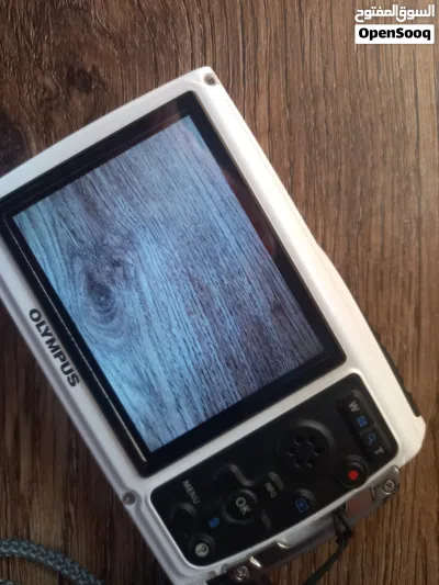 كاميرا Olympus Tough TG-310 بحالة الوكالة ومع وصلة الشاحن الاصلية. 4