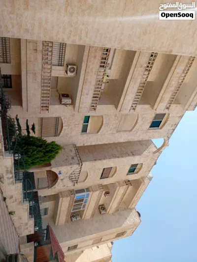 شقة واسعة و مطلة في تلاع العلي قرب كلية الخوارزمي و ادارة الإقامة و الحدود 2