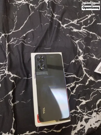 هاتف tcl للبيع والسعر بيكون فل لسته الي حاب يشتري 2