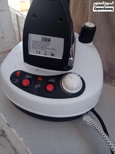 مكوى بخار مع قاعدة tiDA 2