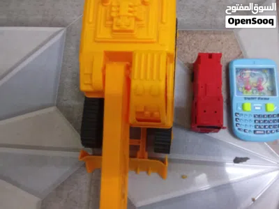 toys for boys car action figure and mobile phone only 11 OMR buy now I'll mabella Seeb bulldozer 2