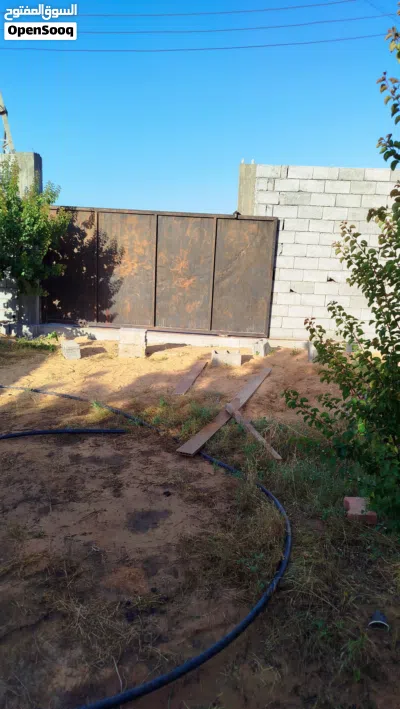 أرض للايجار تصلح لانشاء مغسلة بساطات او مصنع جبس أو طلاء قرافيت بعد اربع شوارع الكهرباء شيل الرحمة 4