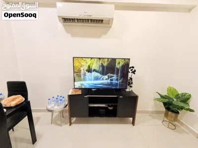 Sofa set with TV size 50 and Tv Stand for sale كراسي جلوس للبيع و تلفزيون مقاس 50 و يونت تلفزيون 2