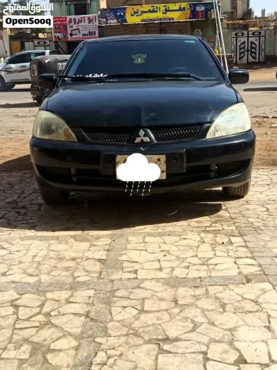 لانسر 2009 3
