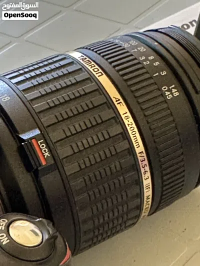 نيكون D3300 بحالة الوكاله مع عدسه TAMRON 4