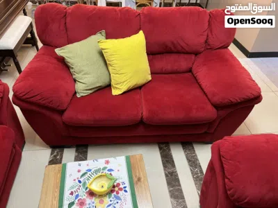 Comfortable and stylish red sofa set in very good condition. 2