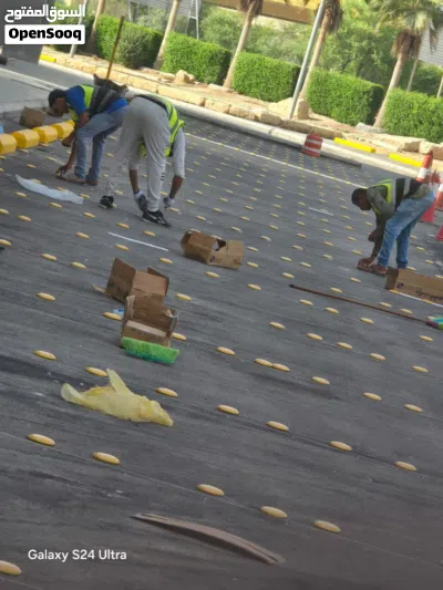 تخطيط طرق ومواقف السيارات ومحطات الوقود دهان حار وبارد ودهان بلدورات ورسومات المعاقين وترقيم المواقف 3