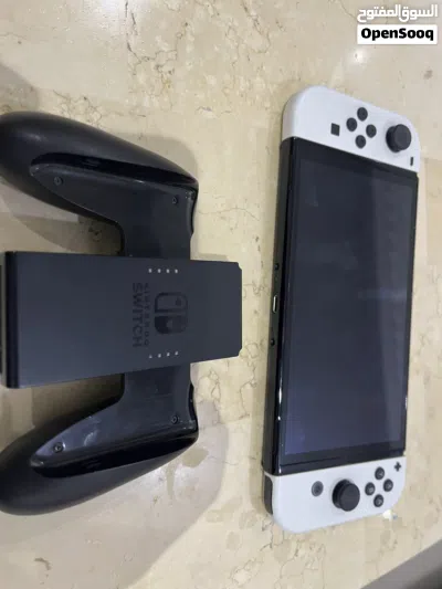 Nintendo Switch OLED 2021 ننتندو سويتش أوليد نظيف جداً + 5 ألعاب + حقيبة 3