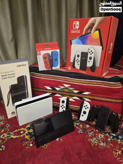 Nintendo Switch OLED نينتندو سويتش اوليد أبيض مع 4 ألعاب أصلية + يدات إضافية + حقيبة + الكرتون 2