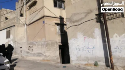 عمارة 3طوابق وتسوية مع 3محلات 3