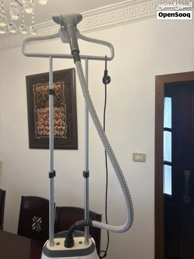 مكوى بخار فلبس ومكوى هوم اليكتريك ومكاوي طاولة بحال الجديد شغال مية بالمية 2