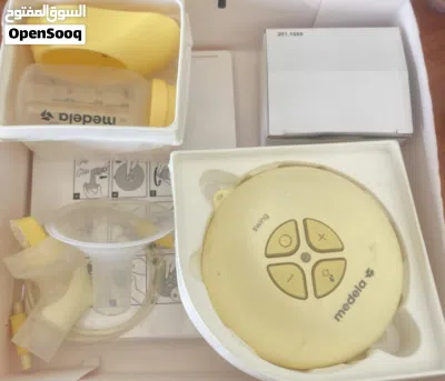 Medela Swing Single Electric Breast شفاط حليب ميديلاPump عبوات حفظ الحليب cooler bag و 3