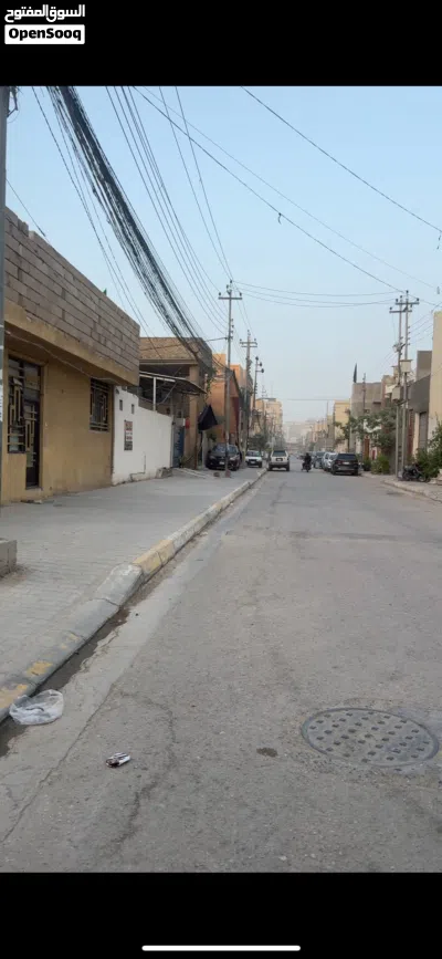 عقار للبيع موقع تجاري مساحه 54 متر واجهه 13متر ونص ونزال 4مترمكان كربلاء حي الامين مقابل دور القضاة 3