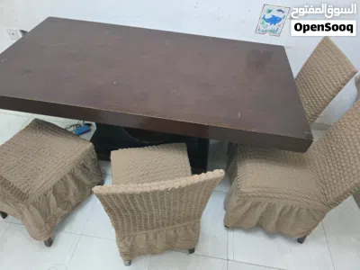 طاولة طعام بحالة جيدة تفك وتركب إلى قطعتين خشب تقيل 3