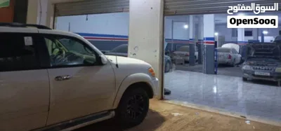 مركز ميكانيكا وكهرباء بكامل المعدات وموقع ممتاز على الرئيسي للبيع عتبة كاملة 3