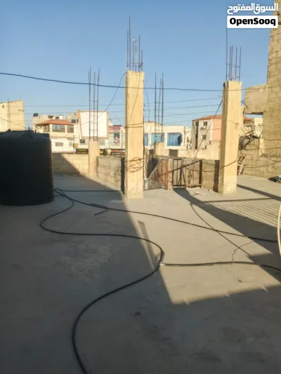 بيت بموقع تجاري للبيع في حي معصوم قرب مثلث حي معصوم مكون من ثلاثة غرف وأرض خلف البيت مساحته 500 متر 4