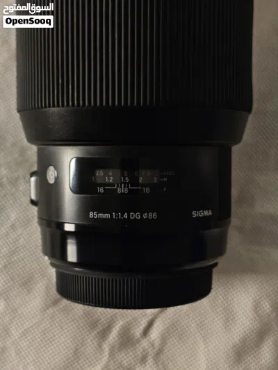 عدسة كانون سيكما ( 85mm - 1.4f ) جدا نظيفة بسعر 700 الف دينار وبي مجال 2