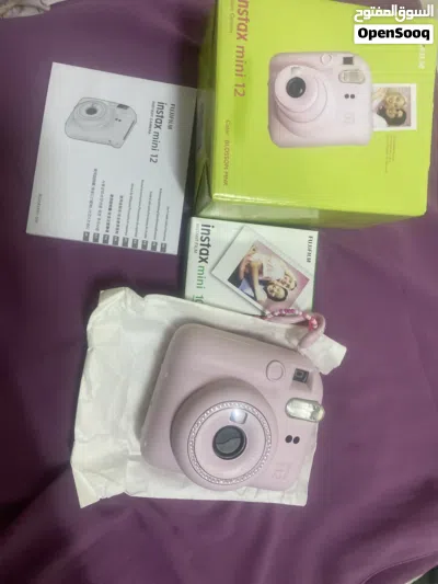 كمره تصوير فوريه بلون الوردي مع 10 صور instax mini 12 camera 2