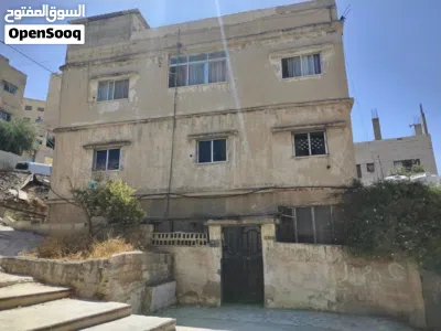 عمارة سكنية للبيع مع 3 مخازن على الشارع الرئيسي 4
