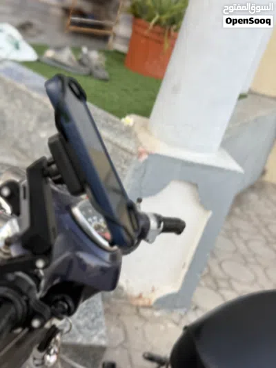 حامل هواتف للدرجات و سكوترات ممتص للصدمات 3