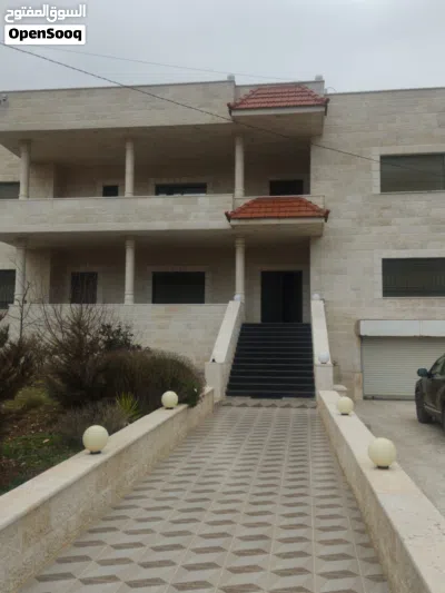 بيت مستقل 4 غرف نوم ماستر روم 4 واجهات حجر بلكونات صالات كراج خزان ماء تدفئه سور حديقه عزل اطلاله ح 4