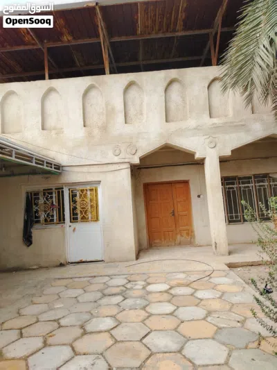 بيت بالقبله حي الجامعة قرب البريد موقع ممتاز قريب ع الشارع 2