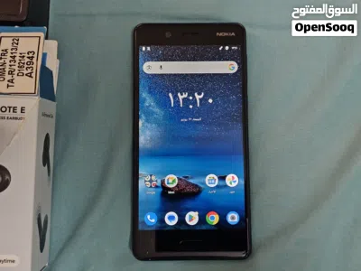 Nokia 8 phone with Bluetooth earphones 2
